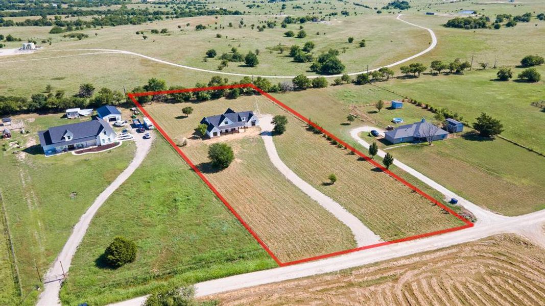 Overview of rural landscape with property parcel outlined