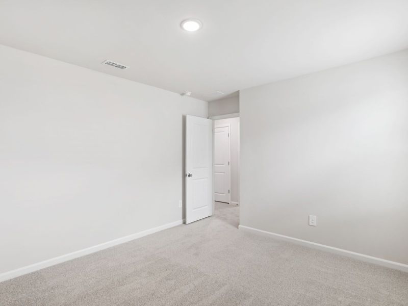 Spacious, unfurnished interior of a new home in River Glen, Angier (Image 22).