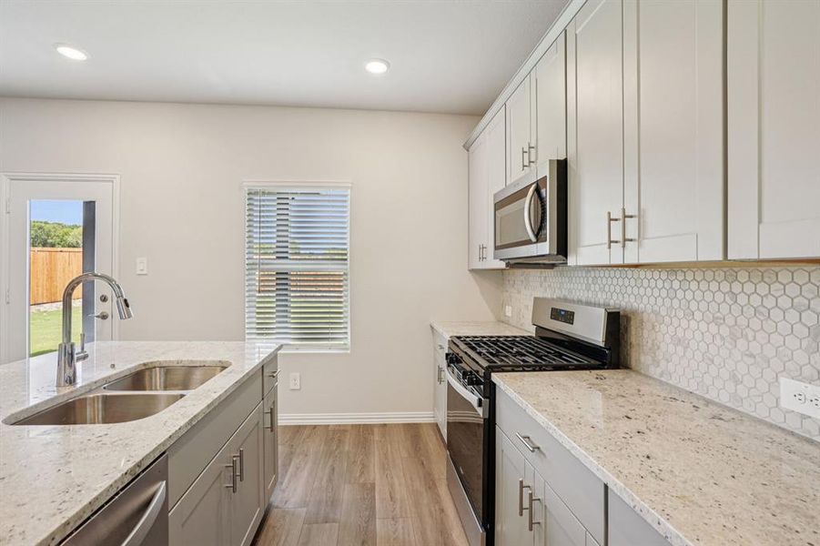 Furnished interior view inside a new home in Westmoor, Sherman (Image 12).