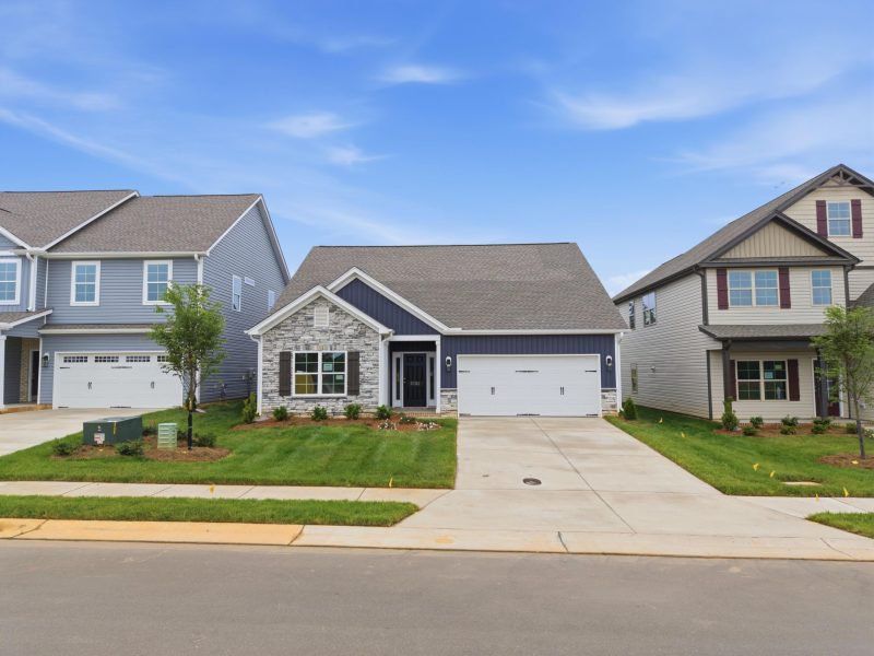 Front exterior of a new home in Sullivans Reserve, Walkertown, NC, highlighting curb appeal (Image 28).