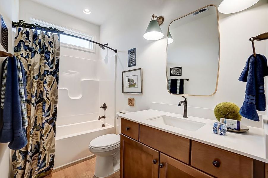 2 story home with a first floor main bedroom