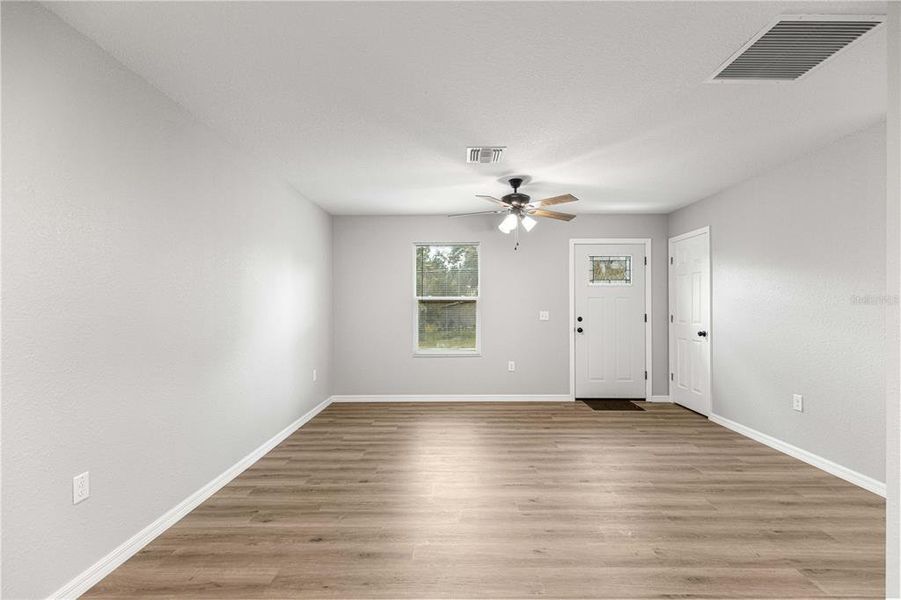 Spacious, unfurnished interior of a new home in , Fort McCoy (Image 24).