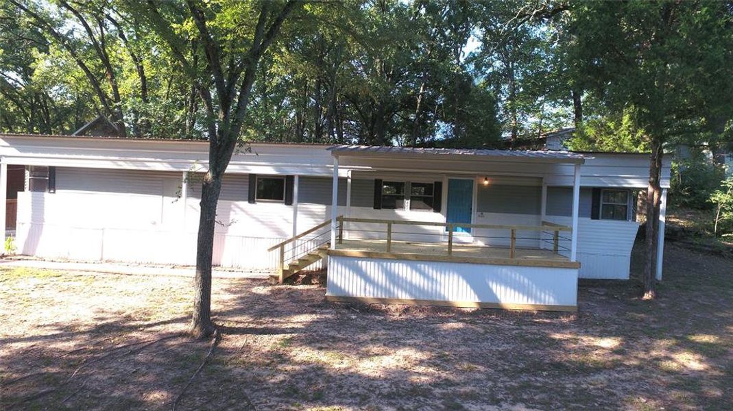 Front exterior of a new home in , Malakoff, TX, highlighting curb appeal (Image 18).