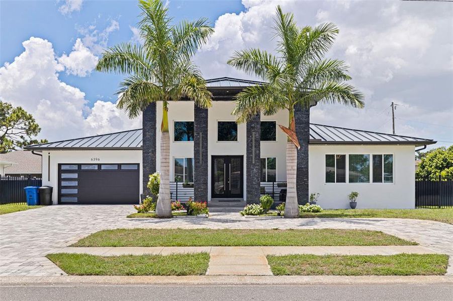 Front exterior of a new home in , St. Petersburg, FL, highlighting curb appeal (Image 18). Front exterior of a new home in , St. Petersburg, FL, highlighting curb appeal (Image 18).