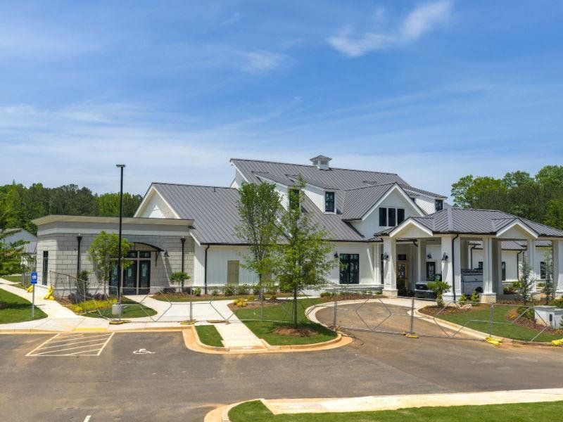 Front exterior of a new home in Soleil Belmont Park, Canton, GA, highlighting curb appeal (Image 2). Front exterior of a new home in Soleil Belmont Park, Canton, GA, highlighting curb appeal (Image 2).