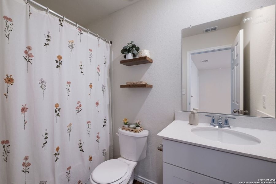 Furnished interior view inside a new home in Winding Brook, San Antonio (Image 27).