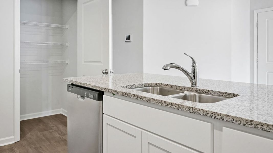 Representative furnished interior of a home built from the BAYSHORE by D.R. Horton in Indigo Preserve Townhomes, Leland (Image 11).