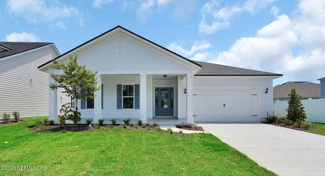 Front exterior of a new home in Forest Park at Wildlight, Yulee, FL, highlighting curb appeal (Image 22).