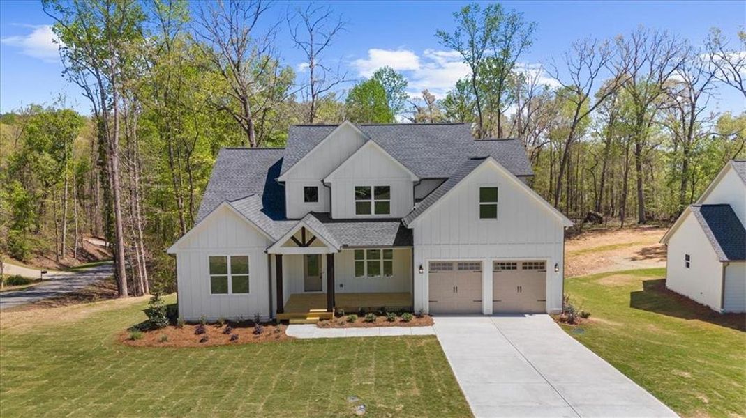 Front exterior of a new home in , Gainesville, GA, highlighting curb appeal (Image 28).