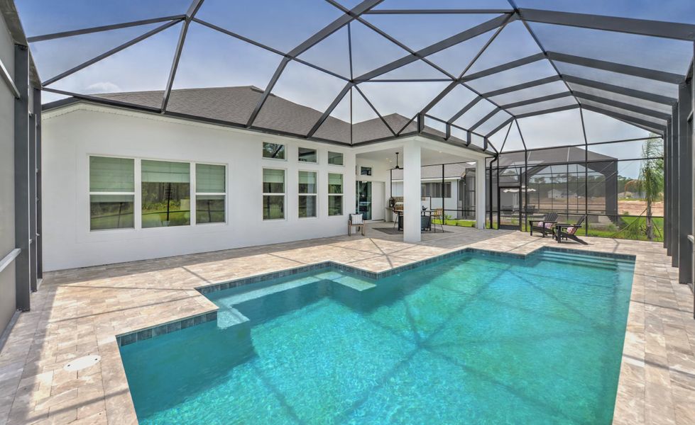 Exterior details and patio area of a home in Plantation Bay, Ormond Beach (Image 3).