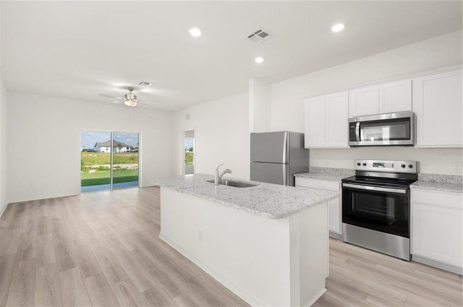 Furnished interior view inside a new home in Gum Lake Preserve, Lake Alfred (Image 5).