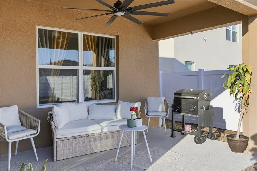 Exterior details and patio area of a home in Wind Meadows South, Bartow (Image 2).