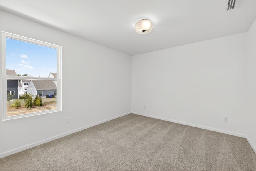 Spacious, unfurnished interior of a new home in Nathans Ridge, Lillington (Image 23).