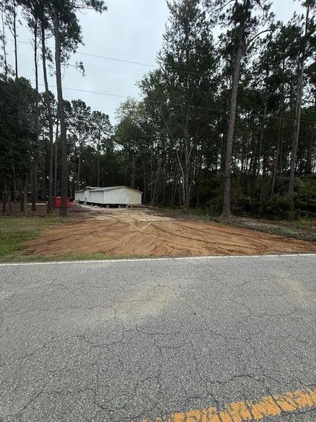 Front exterior of a new home in , Ridgeville, SC, highlighting curb appeal (Image 5).