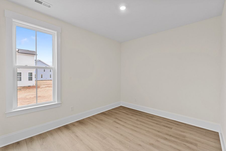 Spacious, unfurnished interior of a new home in Lilah Grove, Summerfield (Image 39).