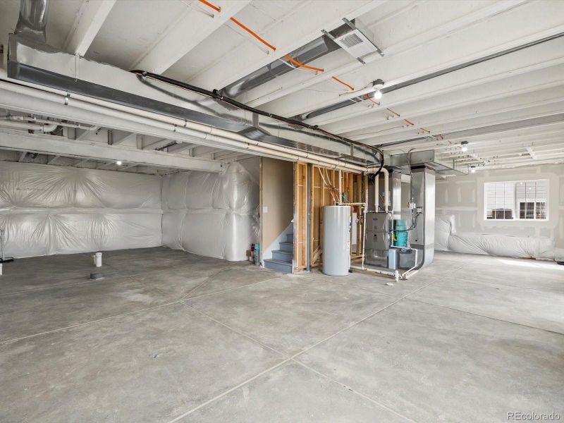 In-progress construction of a new home in Buffalo Highlands: The Canyon Collection, Commerce City, CO (Image 31).