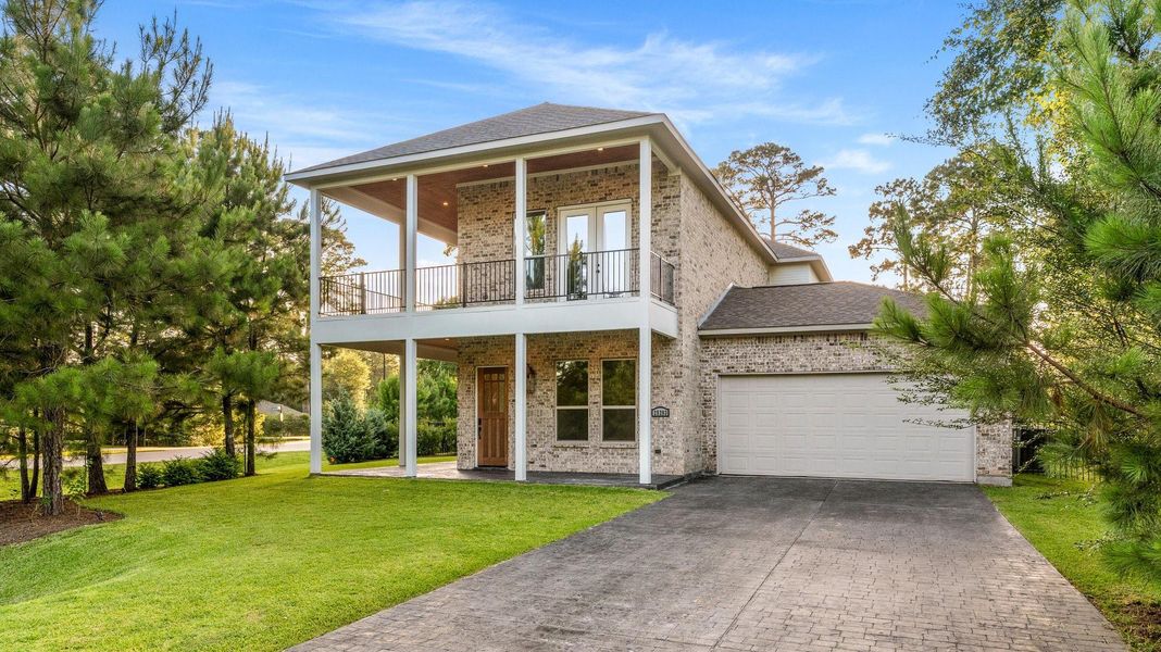 Front exterior of a new home in , Tomball, TX, highlighting curb appeal (Image 1). Front exterior of a new home in , Tomball, TX, highlighting curb appeal (Image 1).