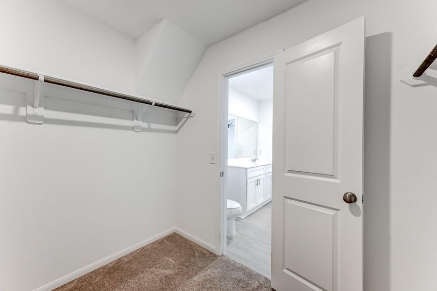 Primary walk in closet Primary walk in closet