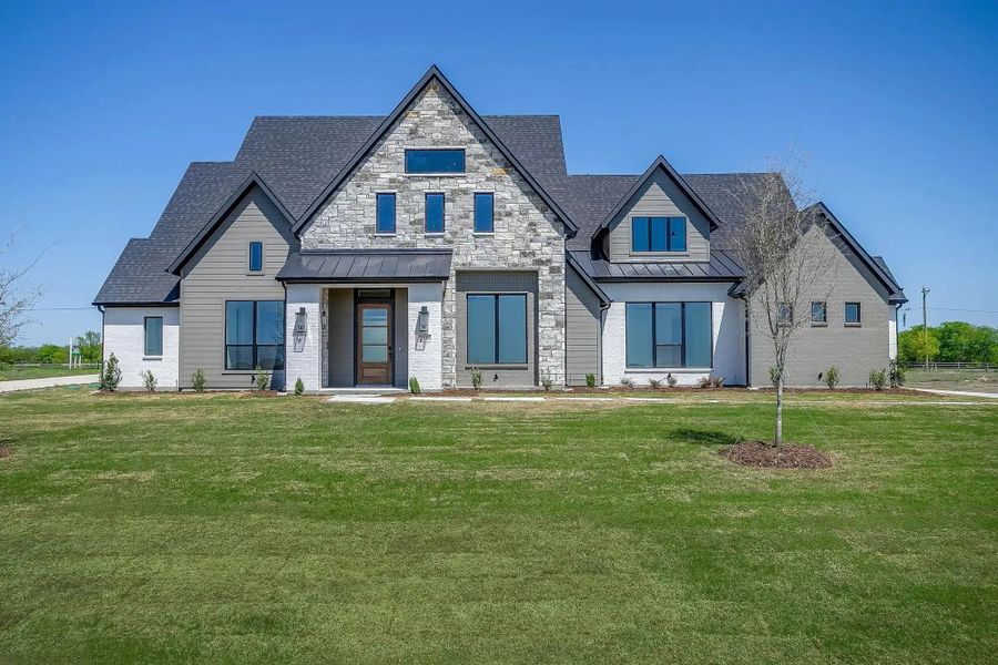 Representative exterior photo of a completed home built from the The Carley by Elmwood Custom Homes in Byrum Ranch, Maypearl, TX (Image 1).