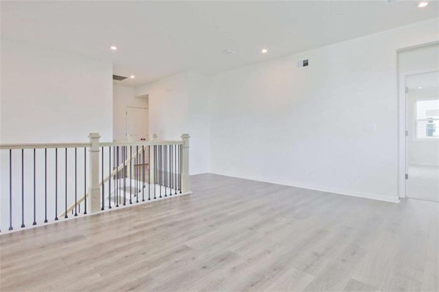 Spacious, unfurnished interior of a new home in The Paddocks at Doc Hughes, Buford (Image 40).