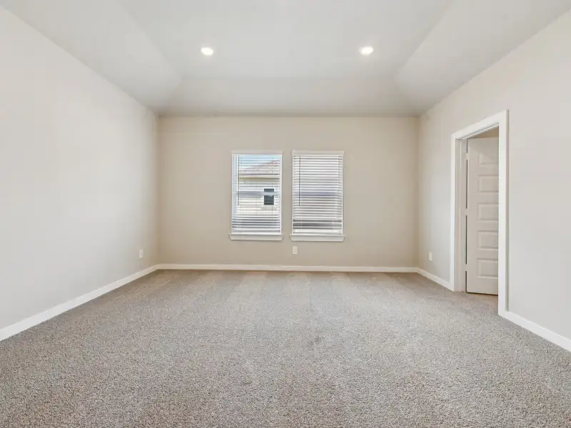 Spacious, unfurnished interior of a new home in Bridge Creek Village - City Series, Cypress (Image 21). Spacious, unfurnished interior of a new home in Bridge Creek Village - City Series, Cypress (Image 21).