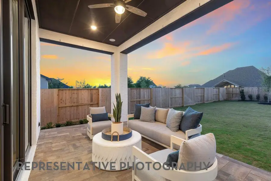 Exterior details and patio area of a home in Meridiana, Manvel (Image 2).