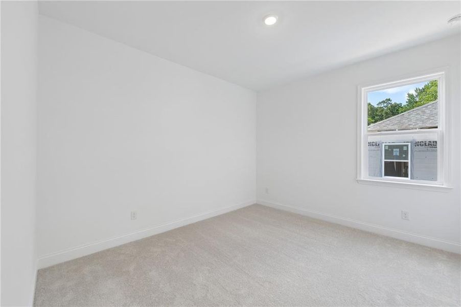 Spacious, unfurnished interior of a new home in Bailey Fence, Dacula (Image 26).