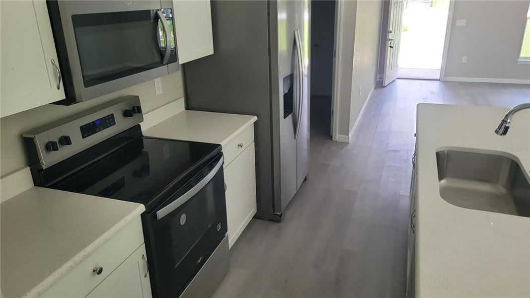 Furnished interior view inside a new home in , Dunnellon (Image 6).