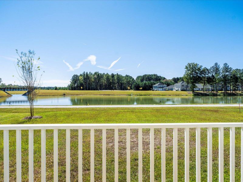 Exterior details and patio area of a home in The Coves at Lakes of Cane Bay II, Summerville (Image 3).