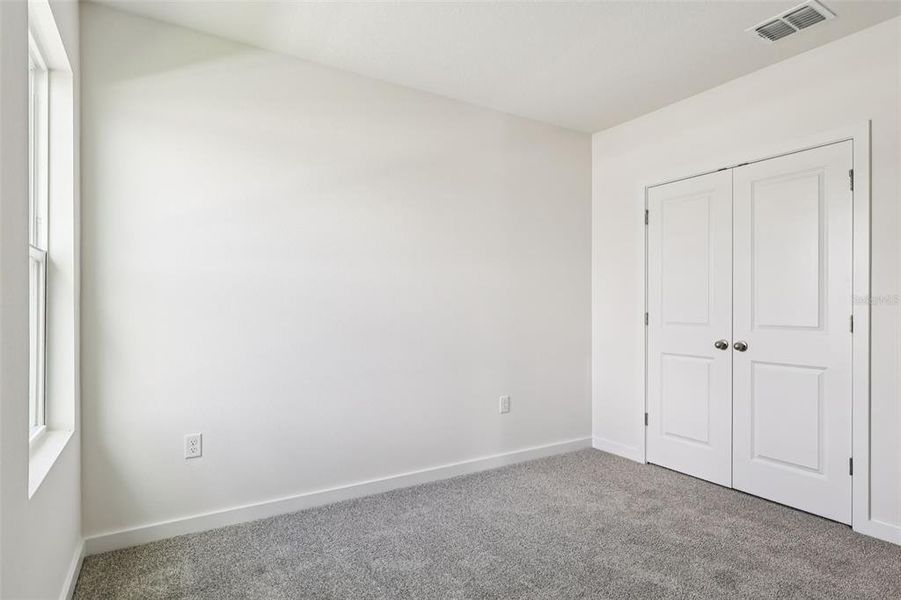 Spacious, unfurnished interior of a new home in Willowbrook North, Winter Haven (Image 25).