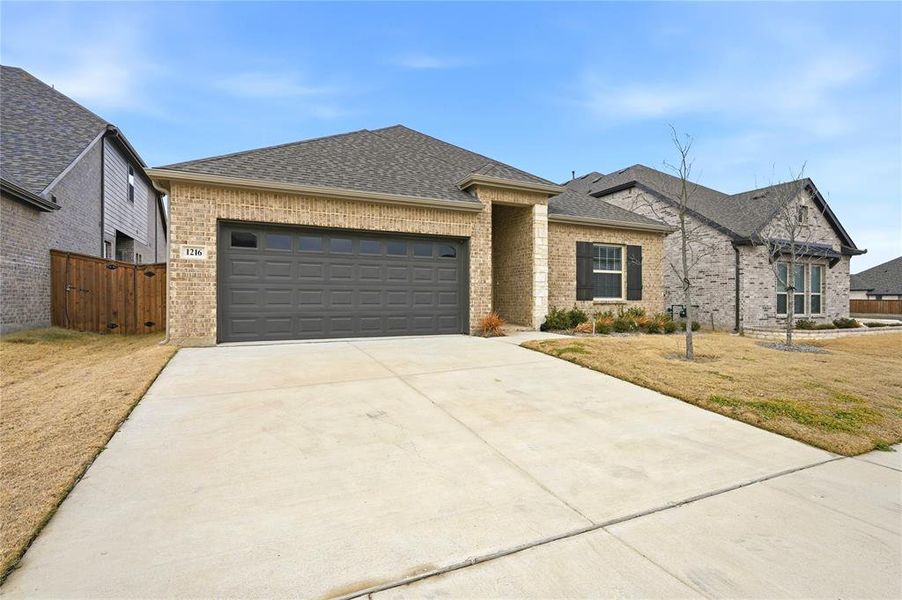 Front exterior of a new home in , Forney, TX, highlighting curb appeal (Image 22).