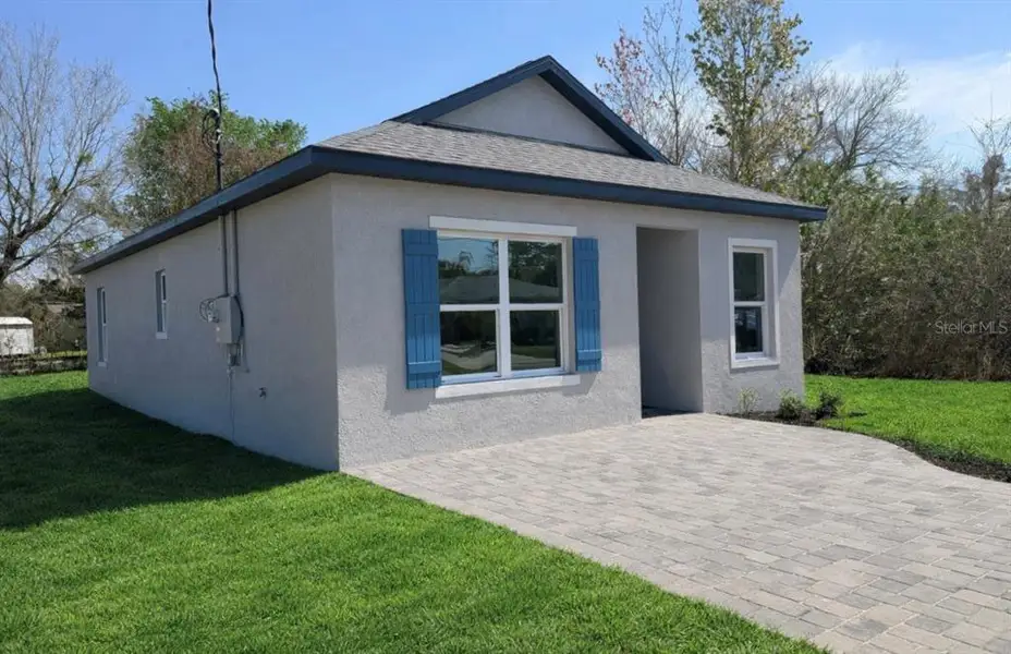 Exterior details and patio area of a home in , Sanford (Image 3).