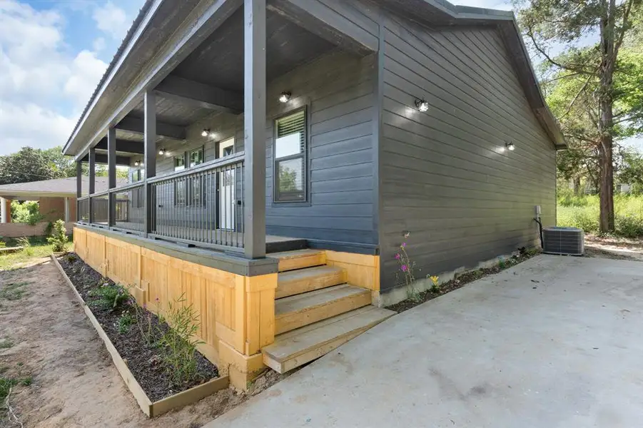 Exterior details and patio area of a home in , Winnsboro (Image 14).
