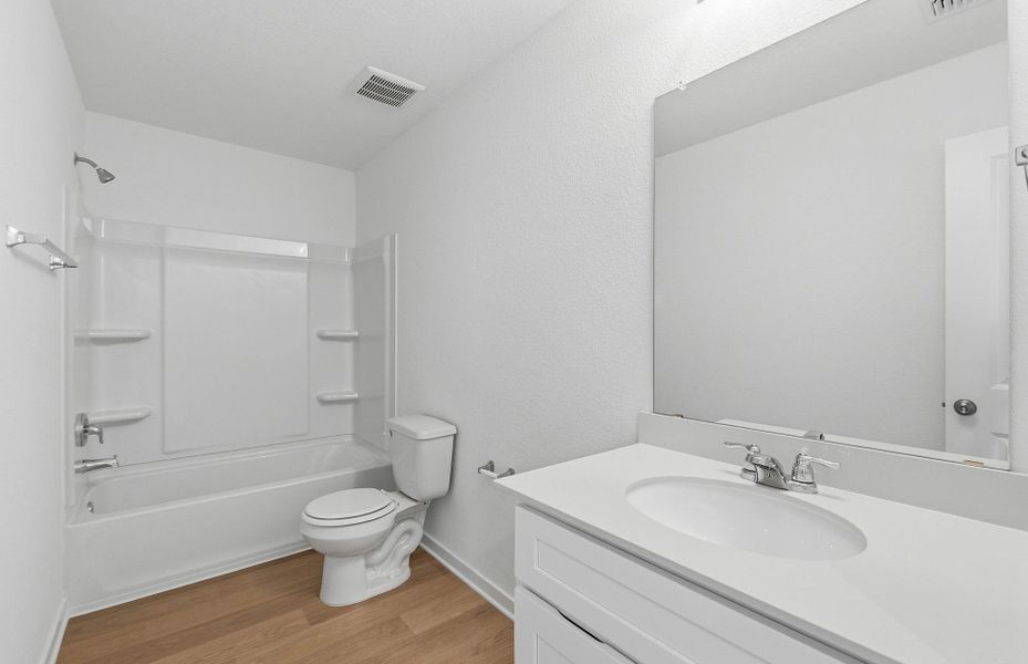 Furnished interior view inside a new home in Sunfield, Buda (Image 13).