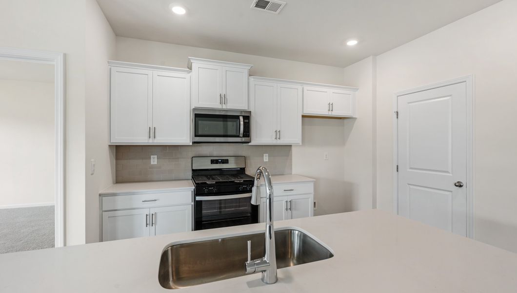 Furnished interior view inside a new home in Durbin Meadows Traditions, Fountain Inn (Image 10). Furnished interior view inside a new home in Durbin Meadows Traditions, Fountain Inn (Image 10).