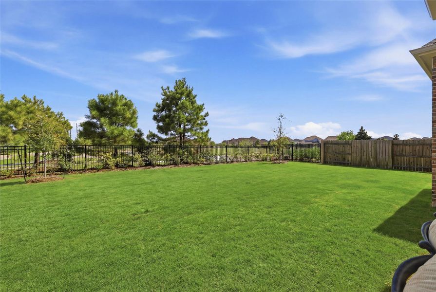 Exterior details and patio area of a home in Elyson, Katy (Image 25).