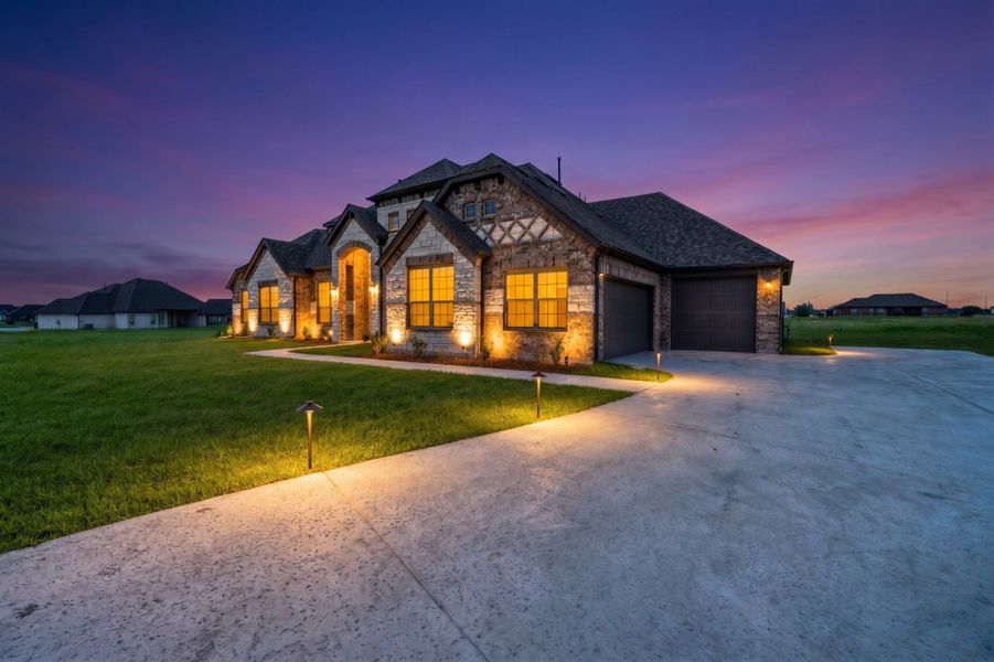 Front exterior of a new home in Creekview Farms, Greenville, TX, highlighting curb appeal (Image 2). Front exterior of a new home in Creekview Farms, Greenville, TX, highlighting curb appeal (Image 2).