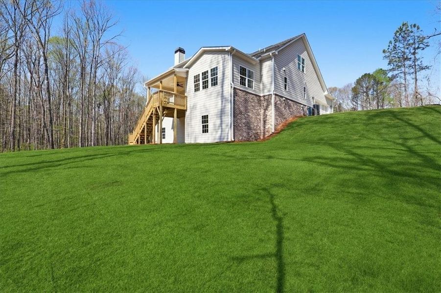 Exterior details and patio area of a home in Bradley Gin, Monroe (Image 40).