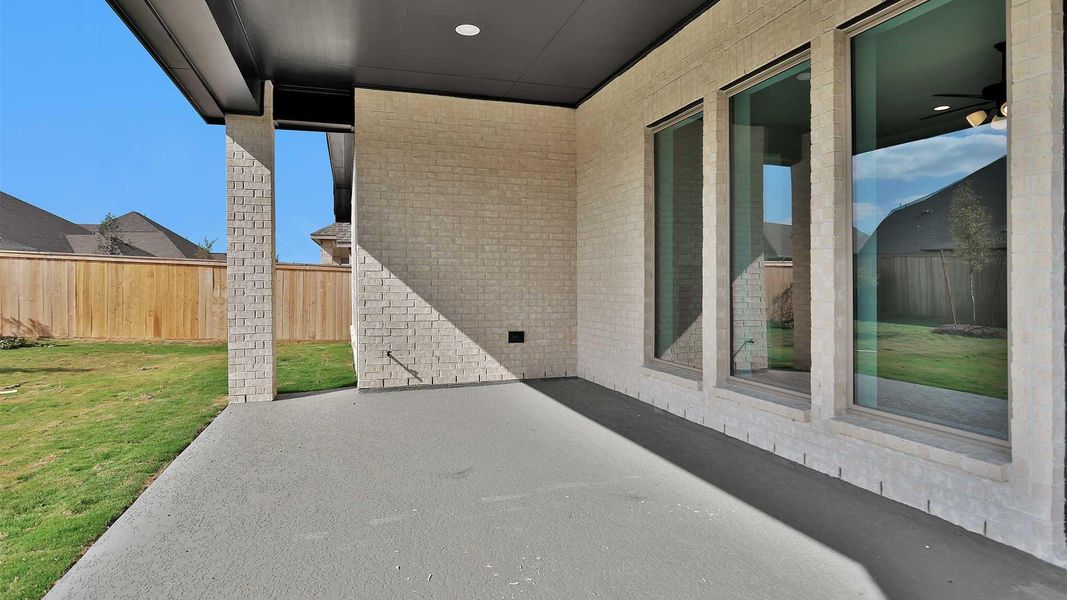 Exterior details and patio area of a home in Bridgeland, Cypress (Image 3).