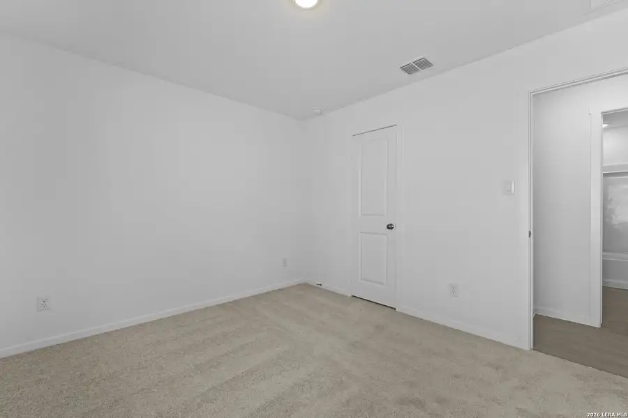 Spacious, unfurnished interior of a new home in Hidden Oasis, San Antonio (Image 27).