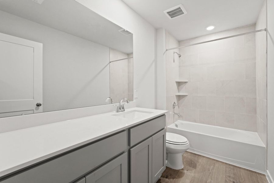 Furnished interior view inside a new home in Woodshore, Clute (Image 11).