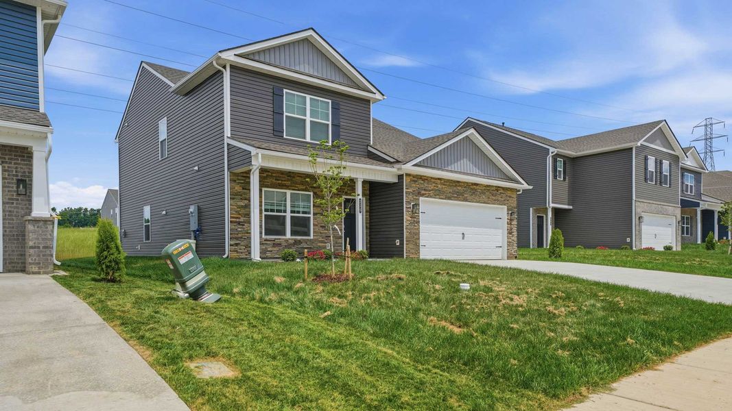 Front exterior of a new home in Fieldcrest Acres, Blountville, TN, highlighting curb appeal (Image 2). Front exterior of a new home in Fieldcrest Acres, Blountville, TN, highlighting curb appeal (Image 2).