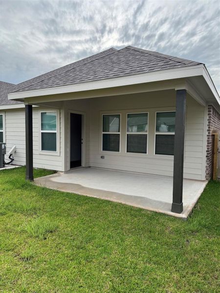 Rear exterior showcases covered patio and functional outdoor living space. Rear exterior showcases covered patio and functional outdoor living space.