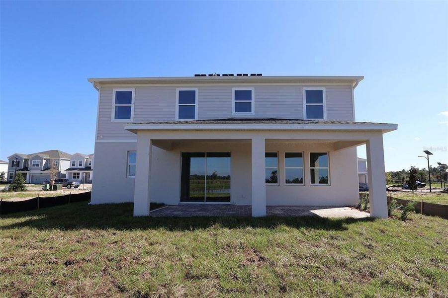 Exterior details and patio area of a home in Bay Lake Farms, St. Cloud (Image 18).