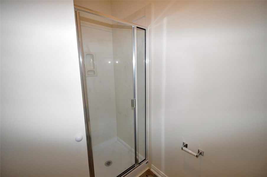 Shower in bath on first floor of garage 1.