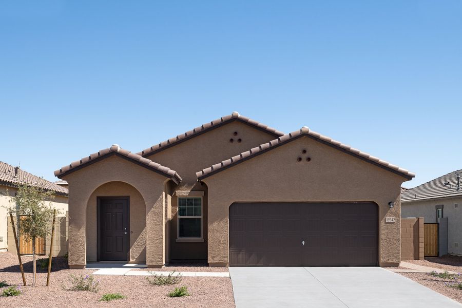 Representative exterior photo of a completed home built from the Sterling by Starlight Homes in Stonebridge Manor, Waddell, AZ (Image 1).