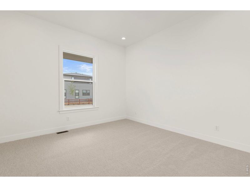 Spacious, unfurnished interior of a new home in RainDance, Windsor (Image 34).