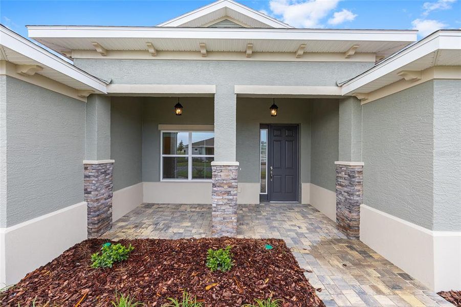 Exterior details and patio area of a home in On Top of the World Communities, Ocala (Image 27).