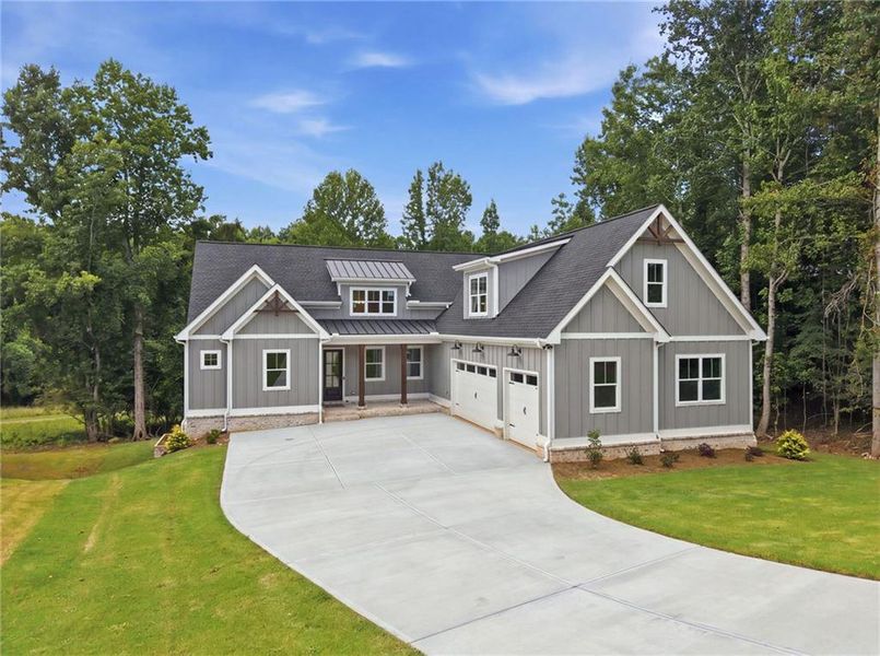 Front exterior of a new home in , Jefferson, GA, highlighting curb appeal (Image 32).