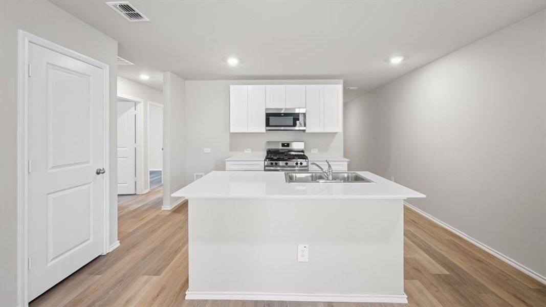 Kitchen - All Home and community information, including pricing, included features, terms, availability and amenities, are subject to change at any time without notice or obligation. All Drawings, pictures, photographs, video, square footages, floor plans, elevations, features, colors and sizes are approximate for illustration purposes only and will vary from the homes as built.